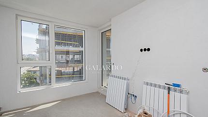 One bedroom apartment in a new building facing a park