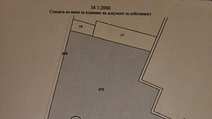 A plot of land with potential facing the ring road, Kazichene district