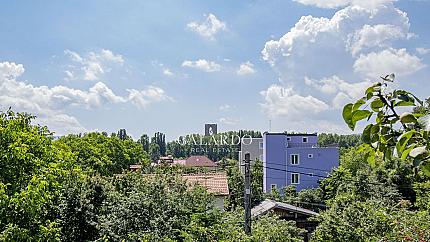 A single-family house with a large yard next to the Bells