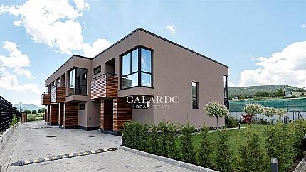 Neat houses in a gated complex in Malinova dolina