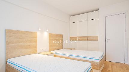 Three-room apartment in the Center of the capital in a new building