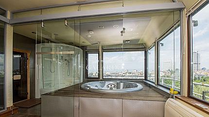 A beautiful 3-level penthouse in South Park residential area with a view of the park