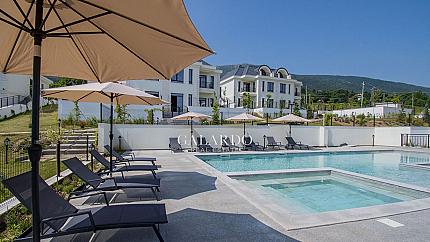 Modern two-bedroom apartment furnished "turnkey" in a luxurious gated complex