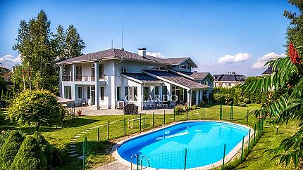 Luxury house with a pool in a gated complex
