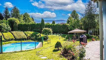 Luxury house with a pool in a gated complex